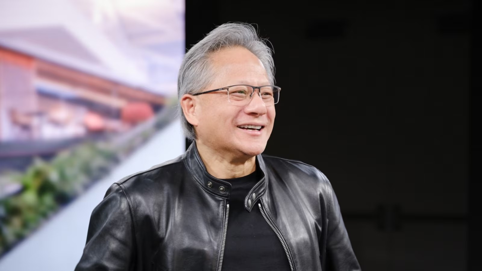 Jensen Huang, le PDG "cool" de Nvidia, signe la poitrine d'une fan au Computex